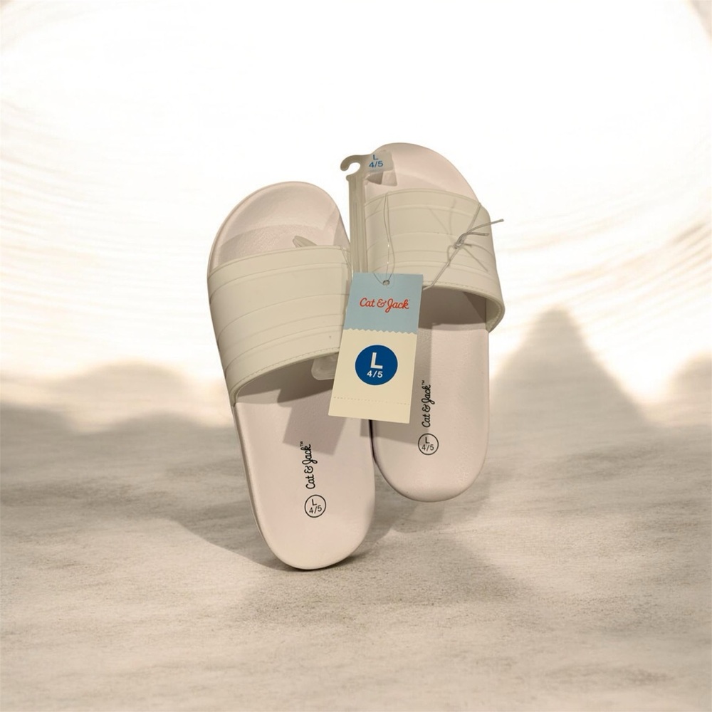 Buy one get one 50% off 
Cat & Jack White Slide Sandals - Pair of Casual Slides